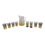 Old pitcher with its 8 yellow granite glasses with gold edging vintage 50's
