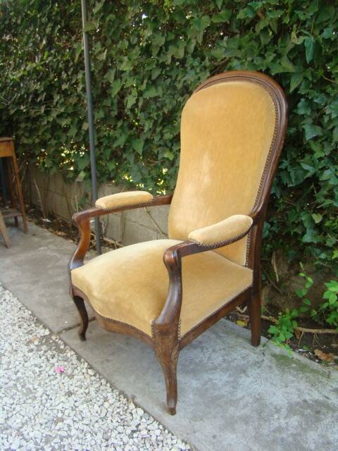 Old walnut Voltaire armchair