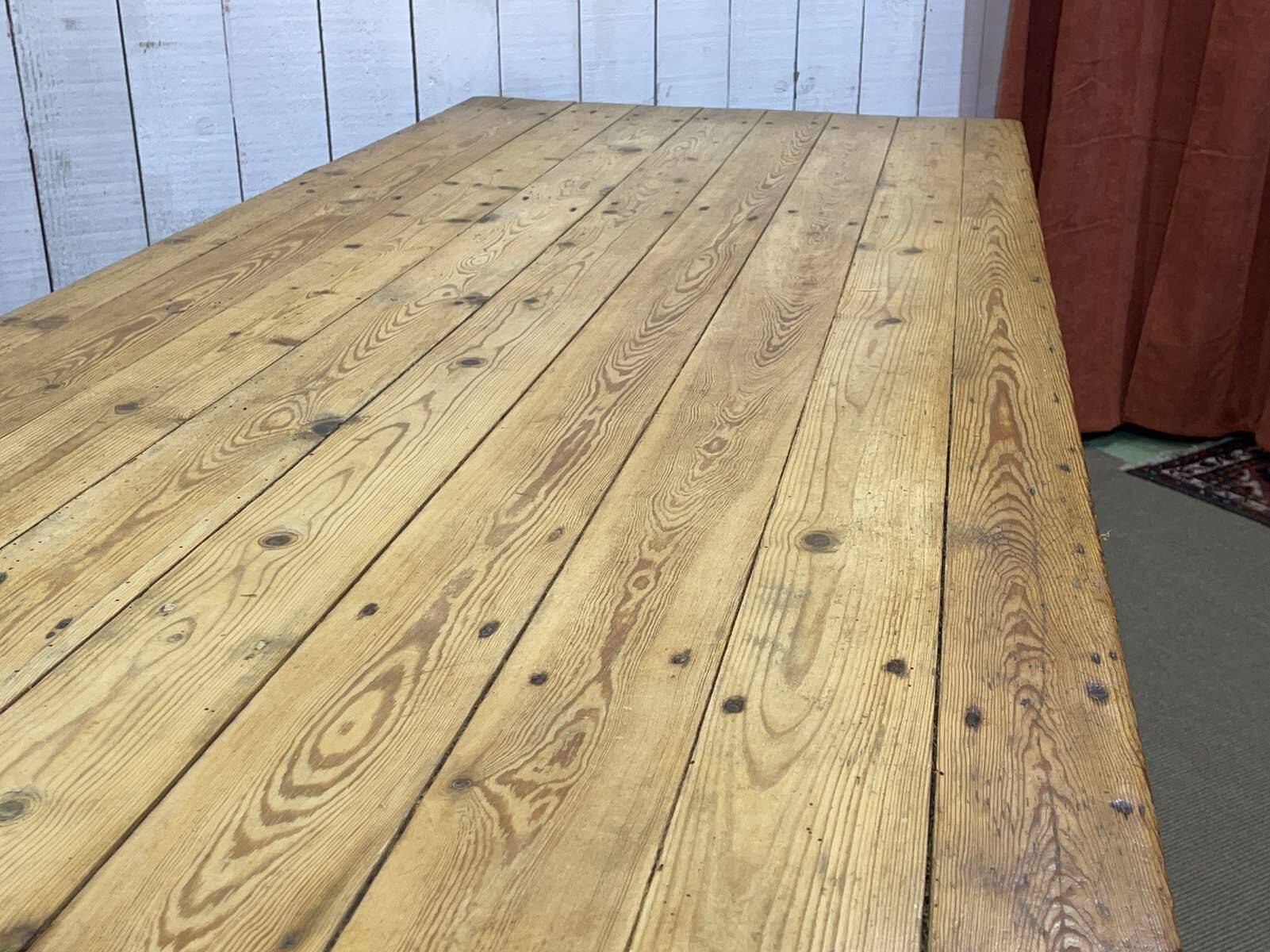 Early 20th-century farmhouse table made of fir, elm, and chestnut.