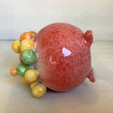 Small tripod vase with multicolored marbles
