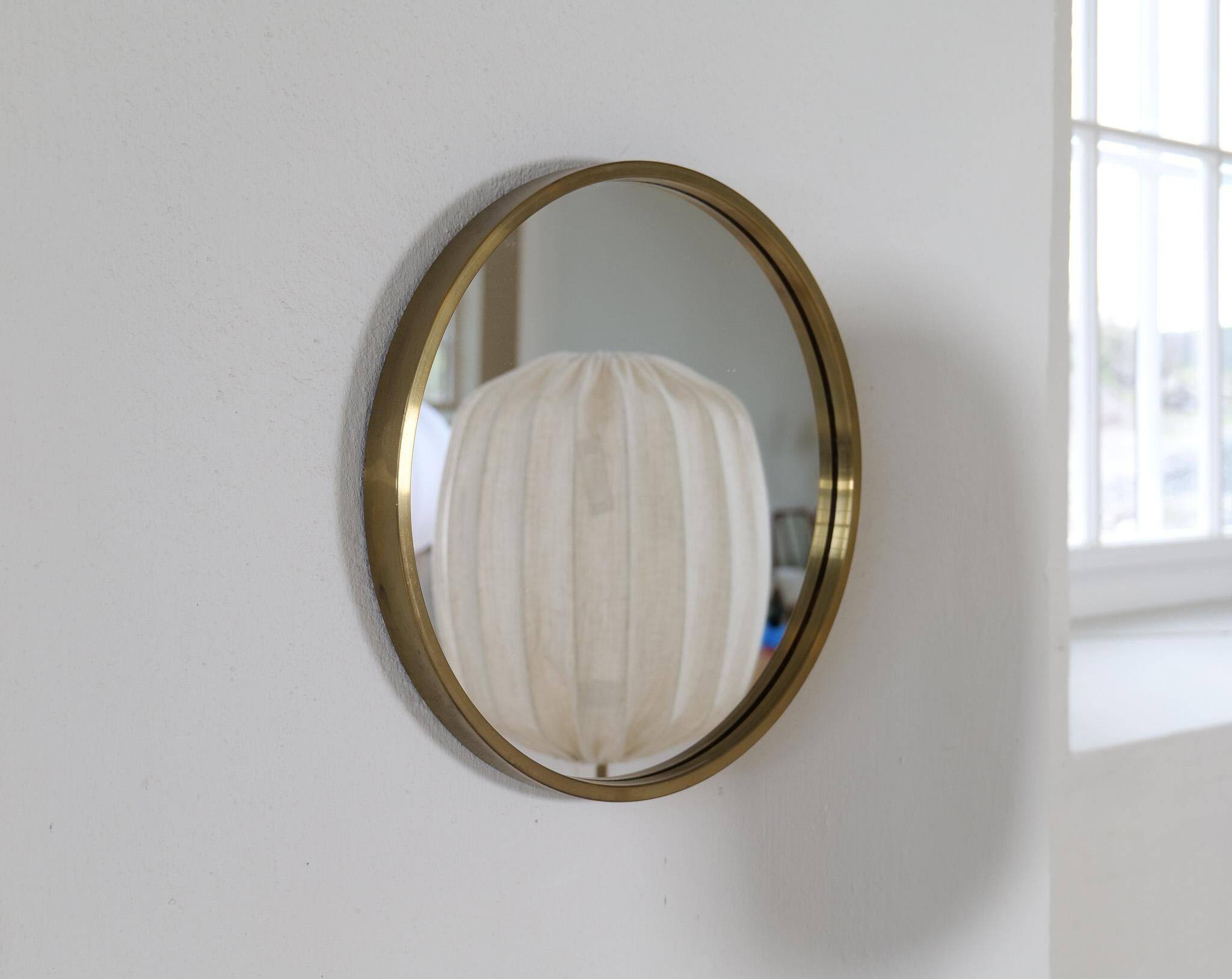 Round brass mirror from the mid-century by Glasmäster in Markaryd, Sweden, 1960s.