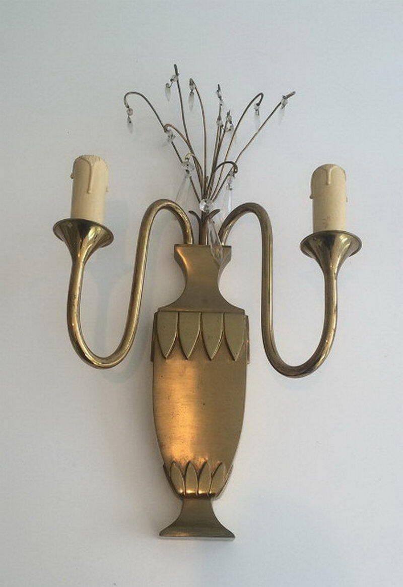 Pair of brass and crystal wall sconces