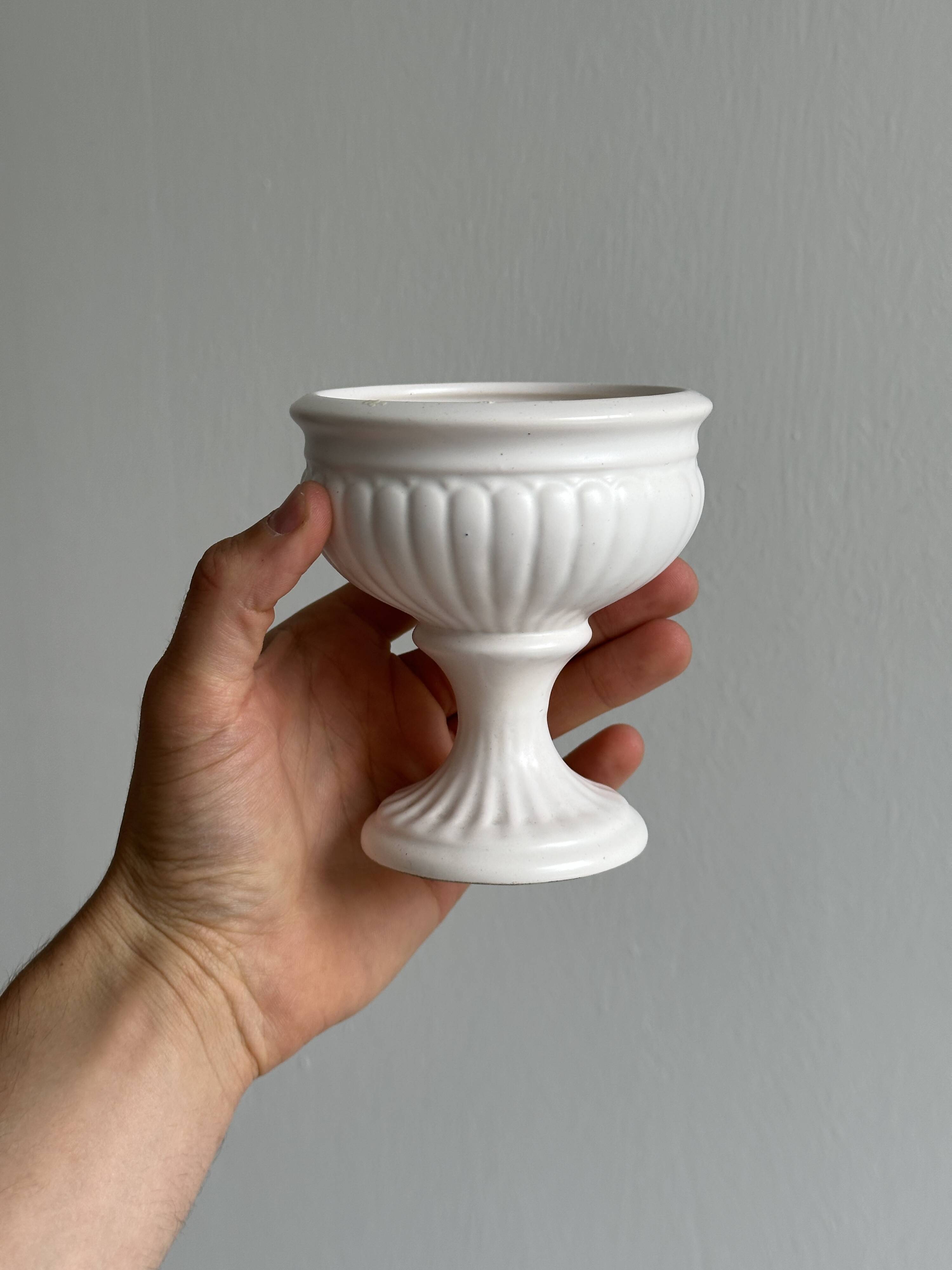 Off-white ceramic footed bowl