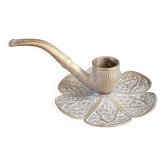Ornate brass pipe candlestick