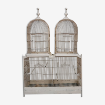 Double cage with birds in wooden metal white rectangular bell tower 1910