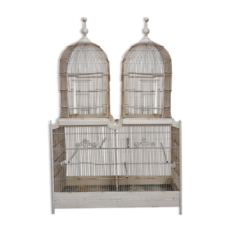Double cage with birds in wooden metal white rectangular bell tower 1910