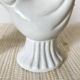 Pair of porcelain candle holders and bird vases