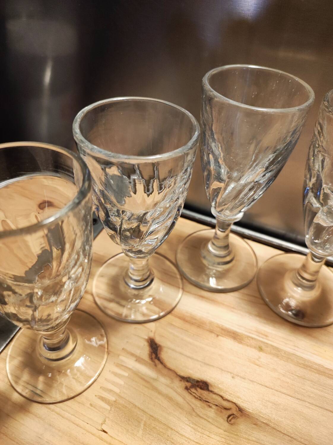 12 small twisted bistro glasses, 19th century