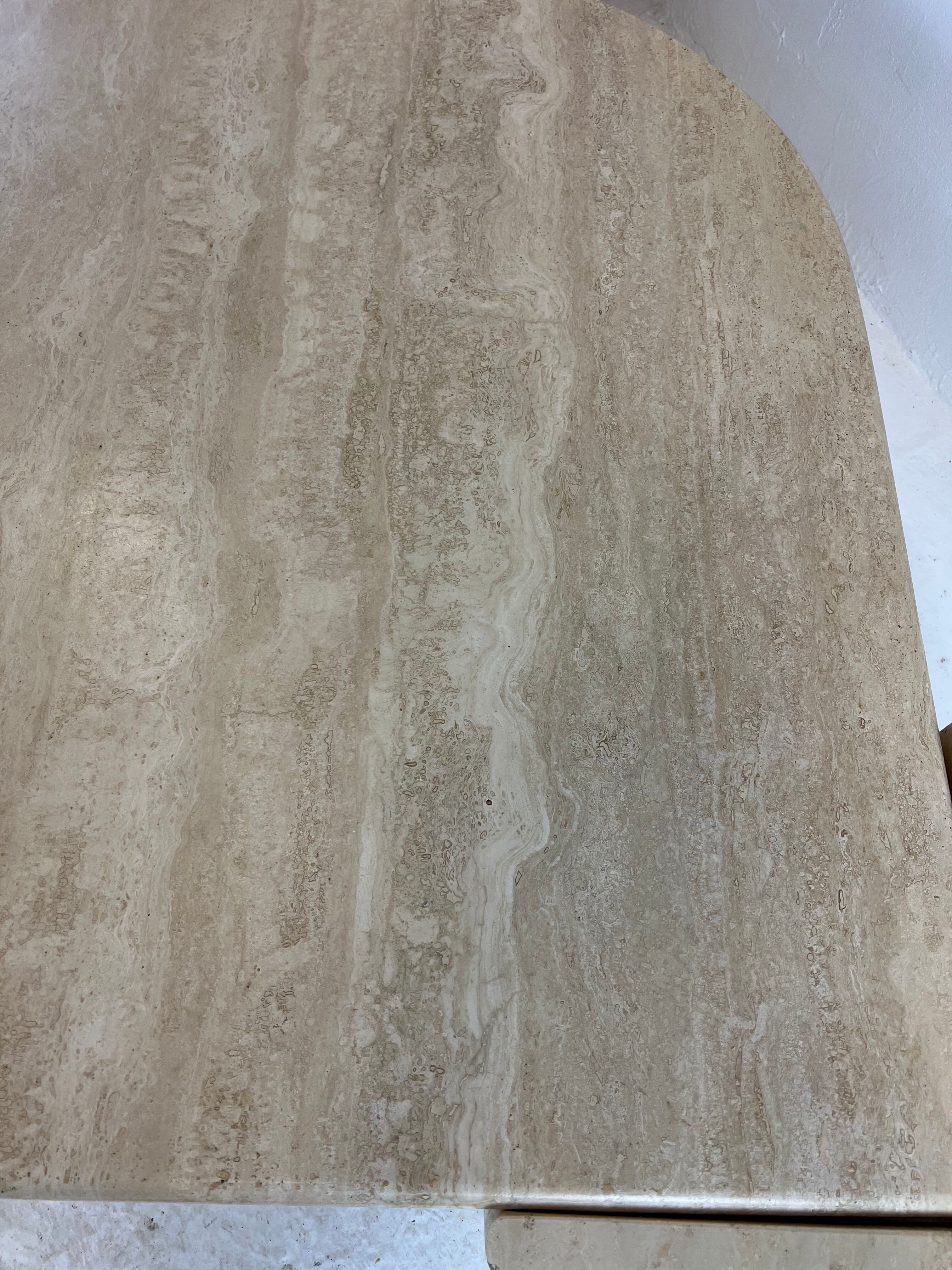 Coffee table Roche Bobois "eye" in travertine, 1970