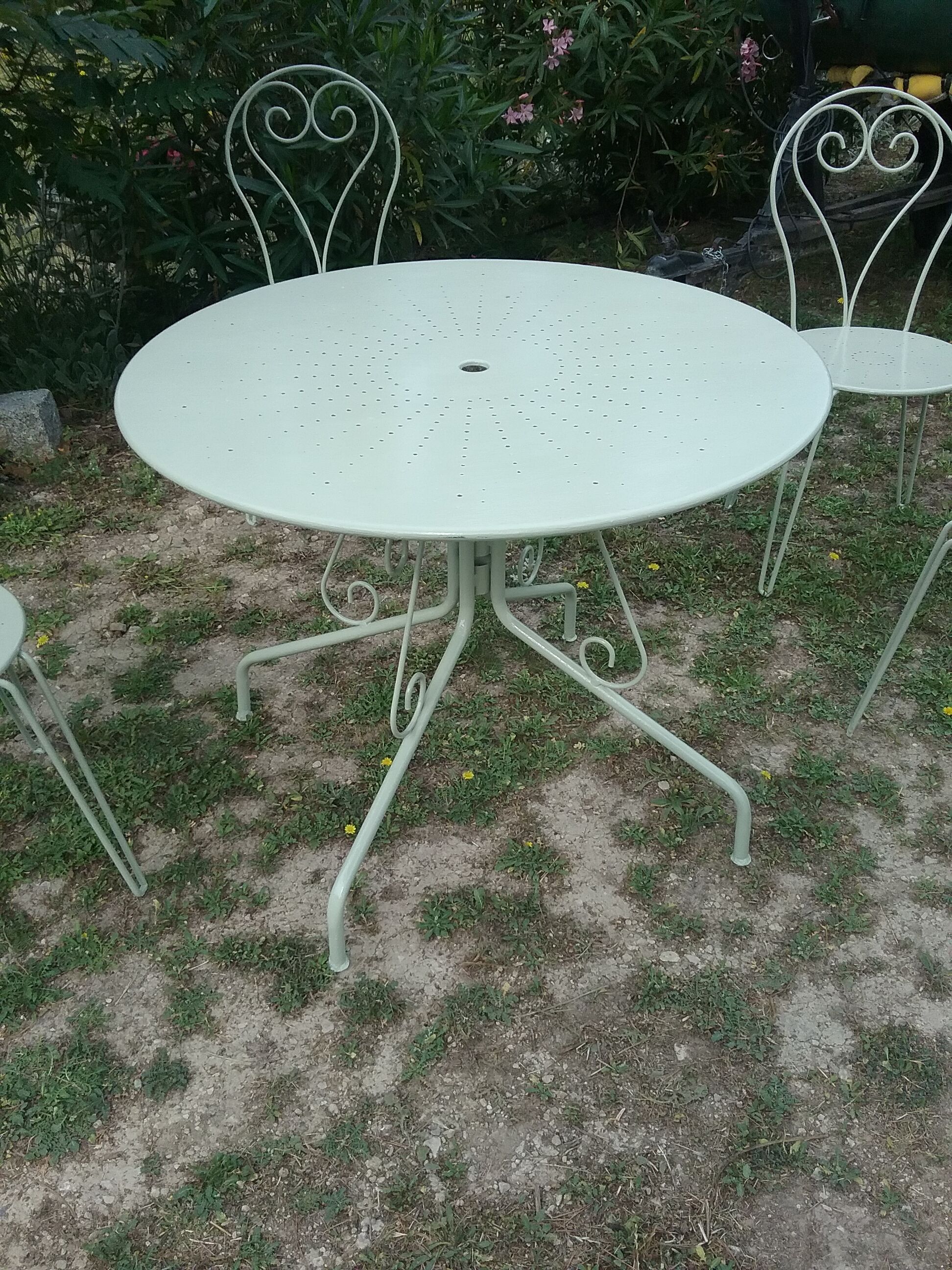 Green wrought iron garden furniture