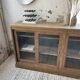 Oak sideboard with glass doors