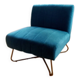 Fauteuil design en velours bleu