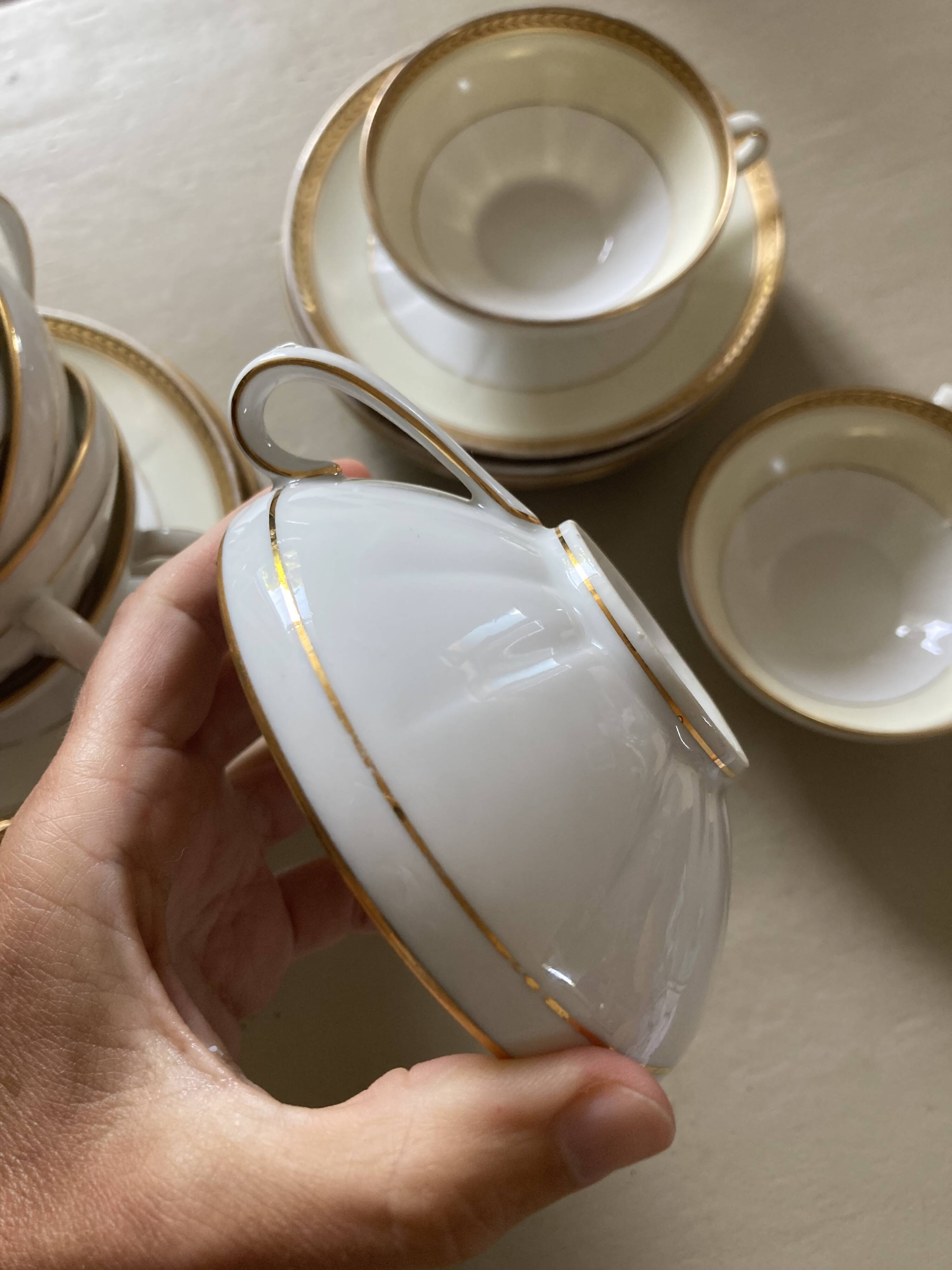 Vintage Limoges porcelain chocolate teacups in pastel yellow and gold
