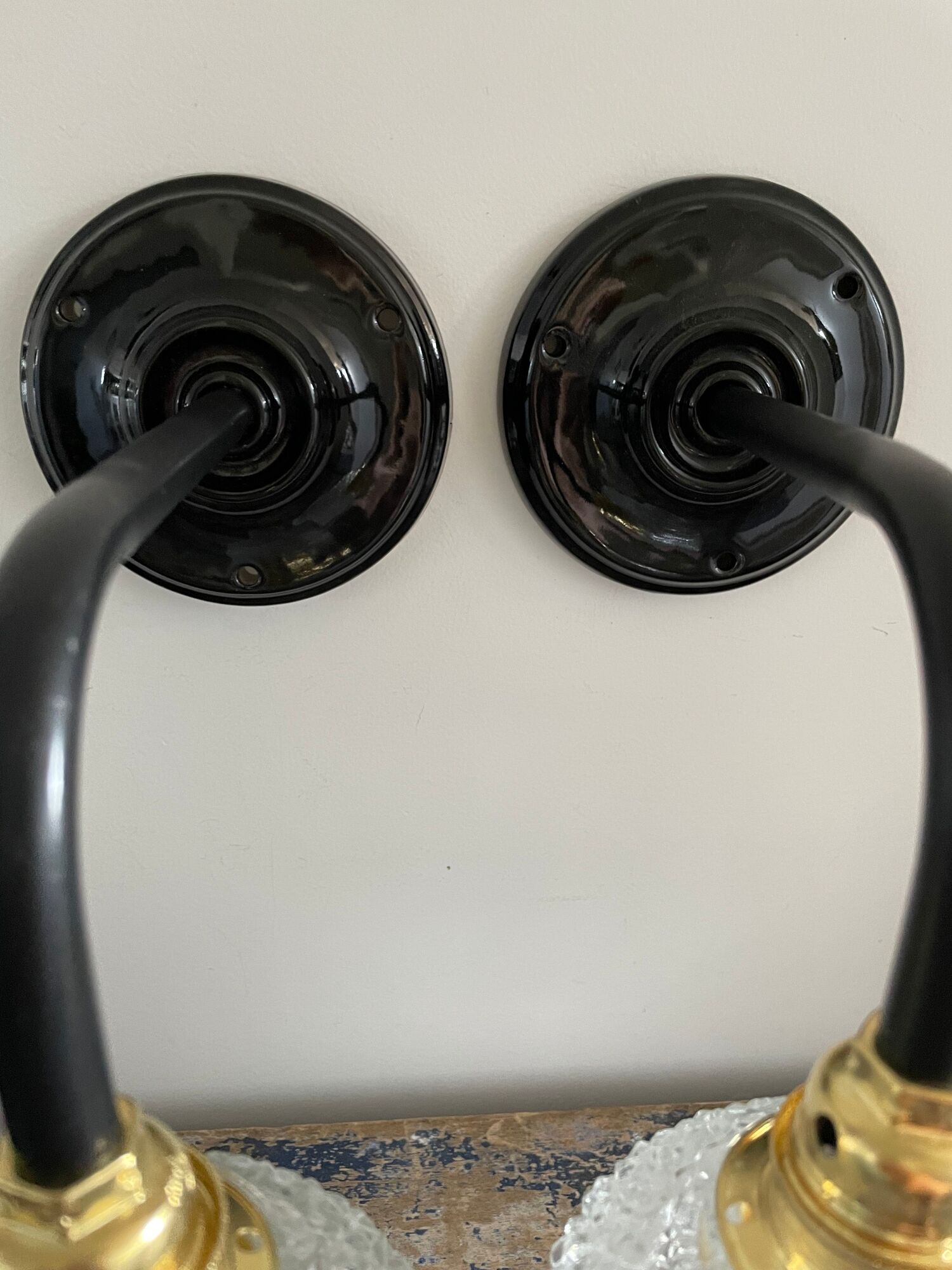 Pair of vintage electrified to nine-piece chiseled glass wall lamps