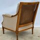 Fauteuil bergère à dossier canné
