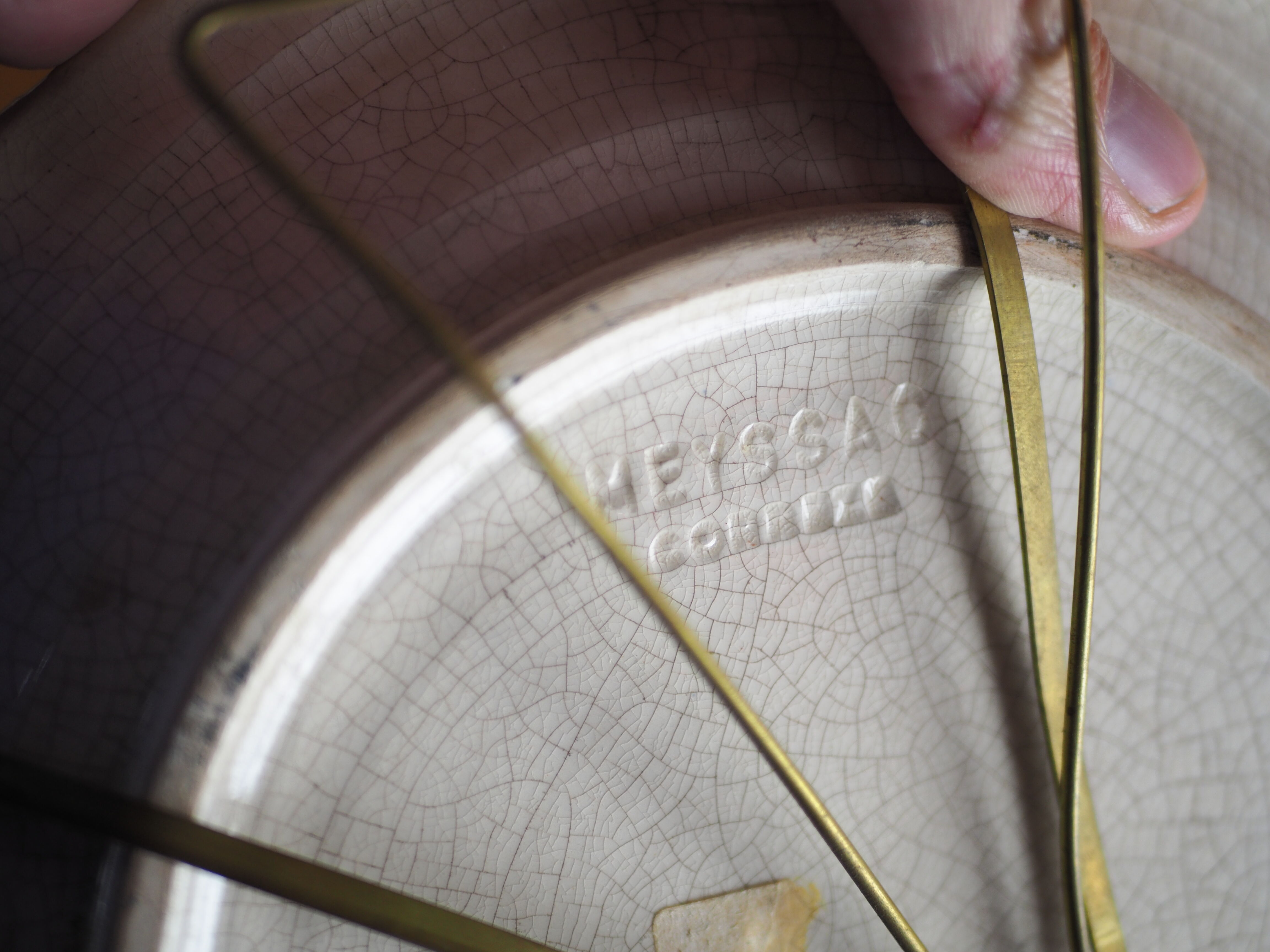 Meyssac plate decorated with flowers on cracked background early twentieth century and its support
