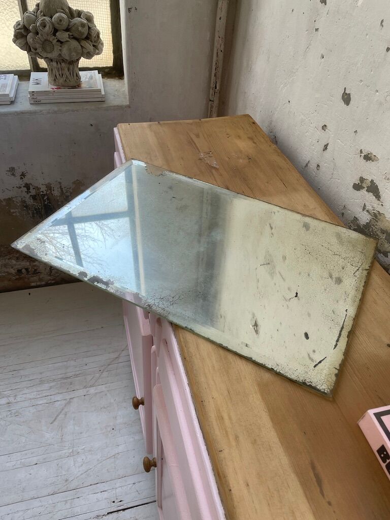 Very stung old bevelled mirror 39x60cm