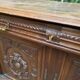 Henri II sideboard in carved wood, 1930.