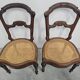 Set of 6 antique dining chairs in solid walnut, cane seats, 19th century.