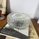 Vintage 1970s round wall light ceiling fixture with transparent glass.