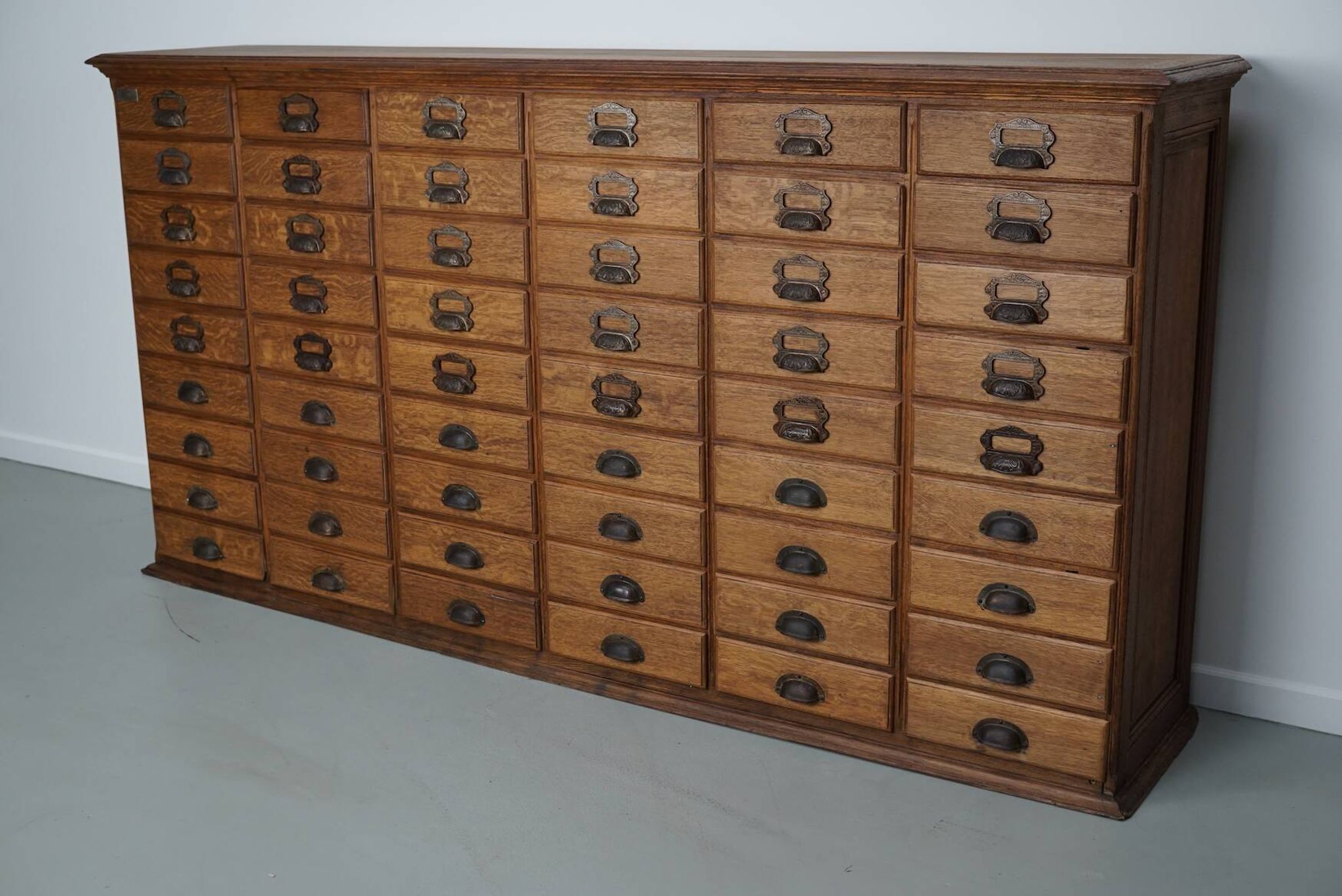 Antique French oak filing / apothecary cabinet by Chouanard, ca 1910