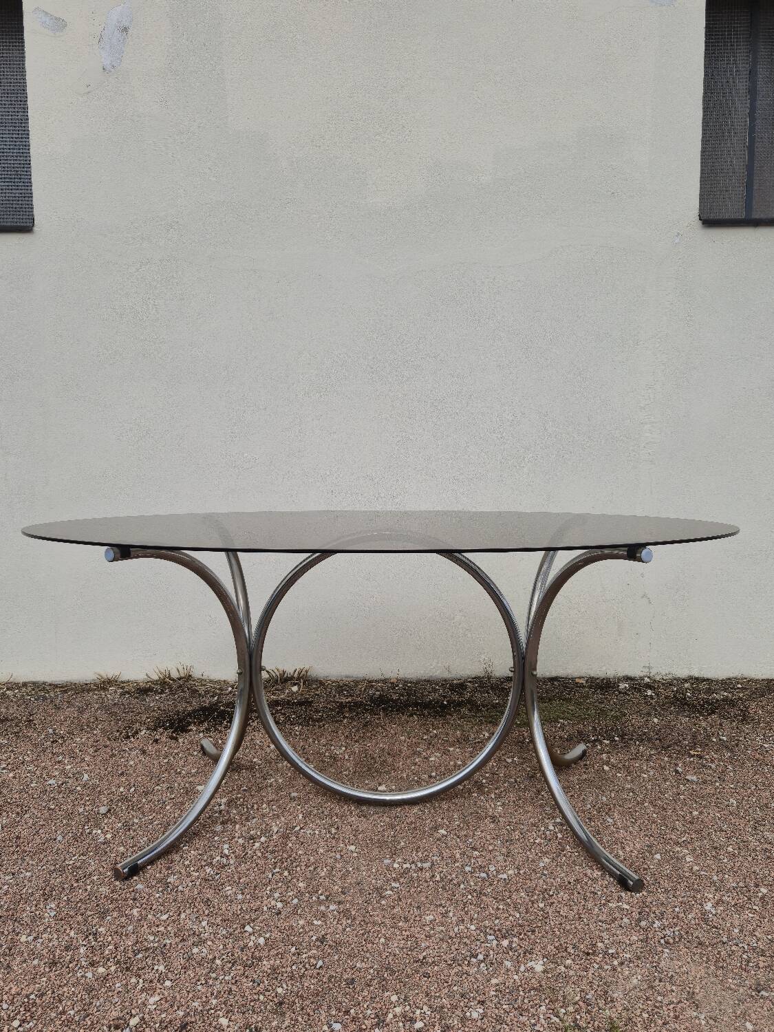 Vintage oval design table in smoked glass and chrome legs