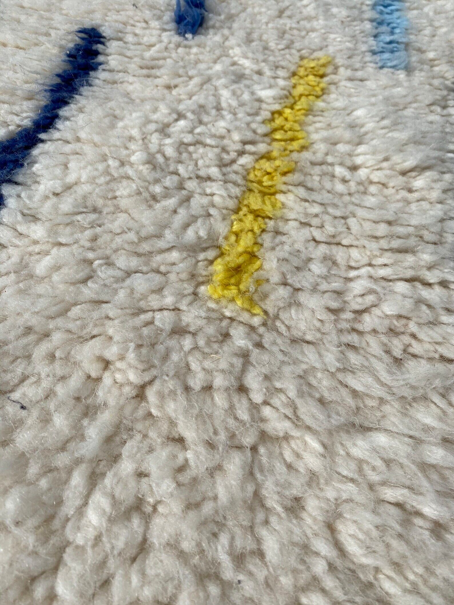 Handmade white abstract wool rug, 180x280 cm
