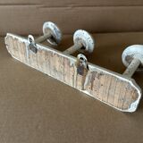 Antique wooden wall-mounted coat rack