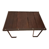 Raw wood and wrought iron coffee table