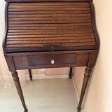 Pretty little secretary with a curtain.