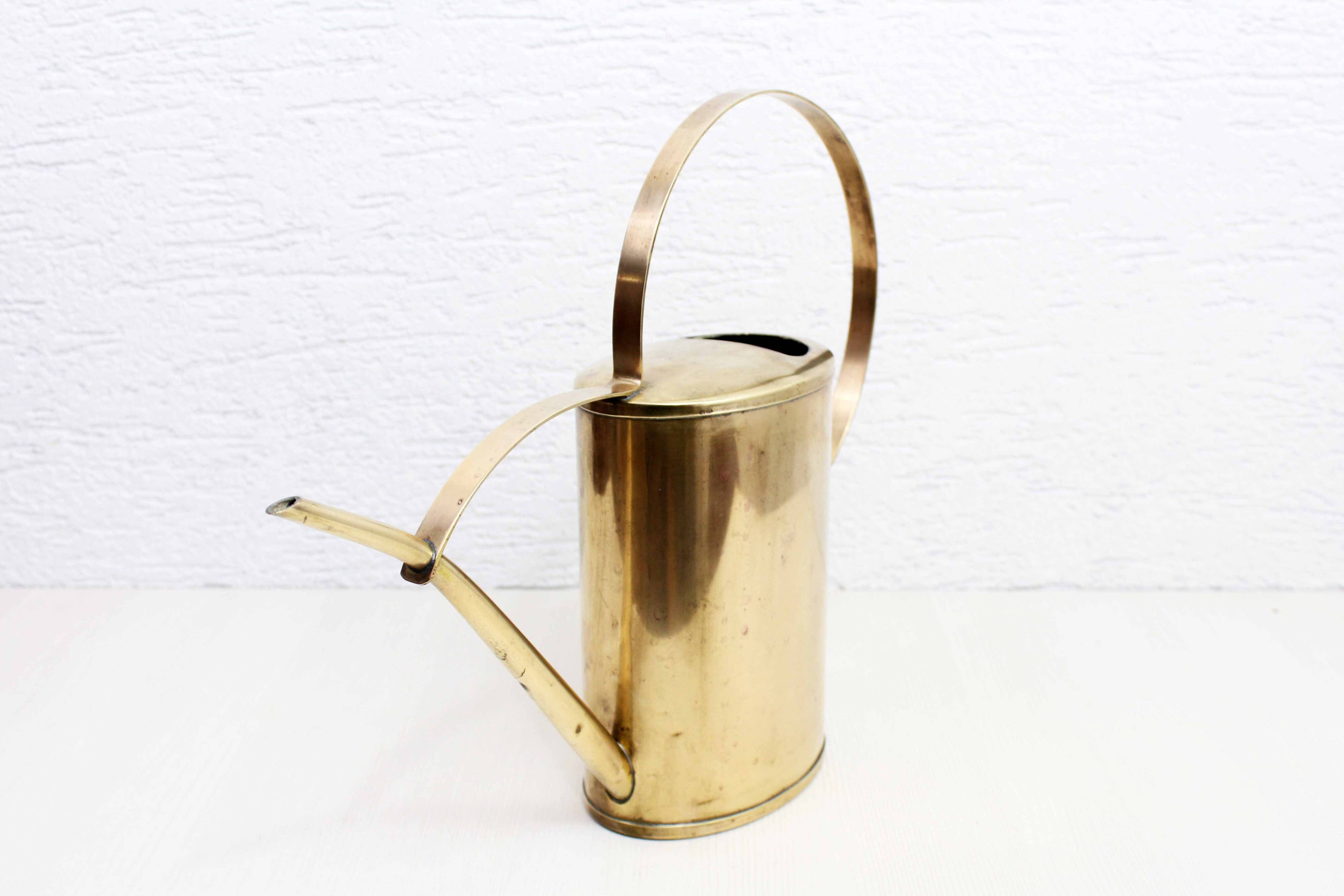 Vintage brass watering can