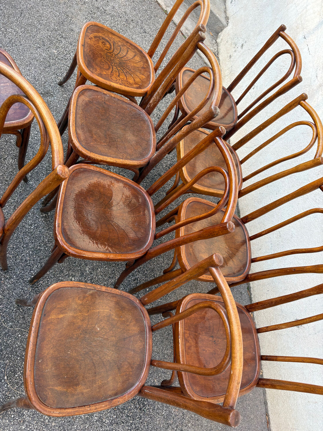 10 varnished patterned bistro chairs