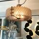Patinated brass lurstre, and Murano glass