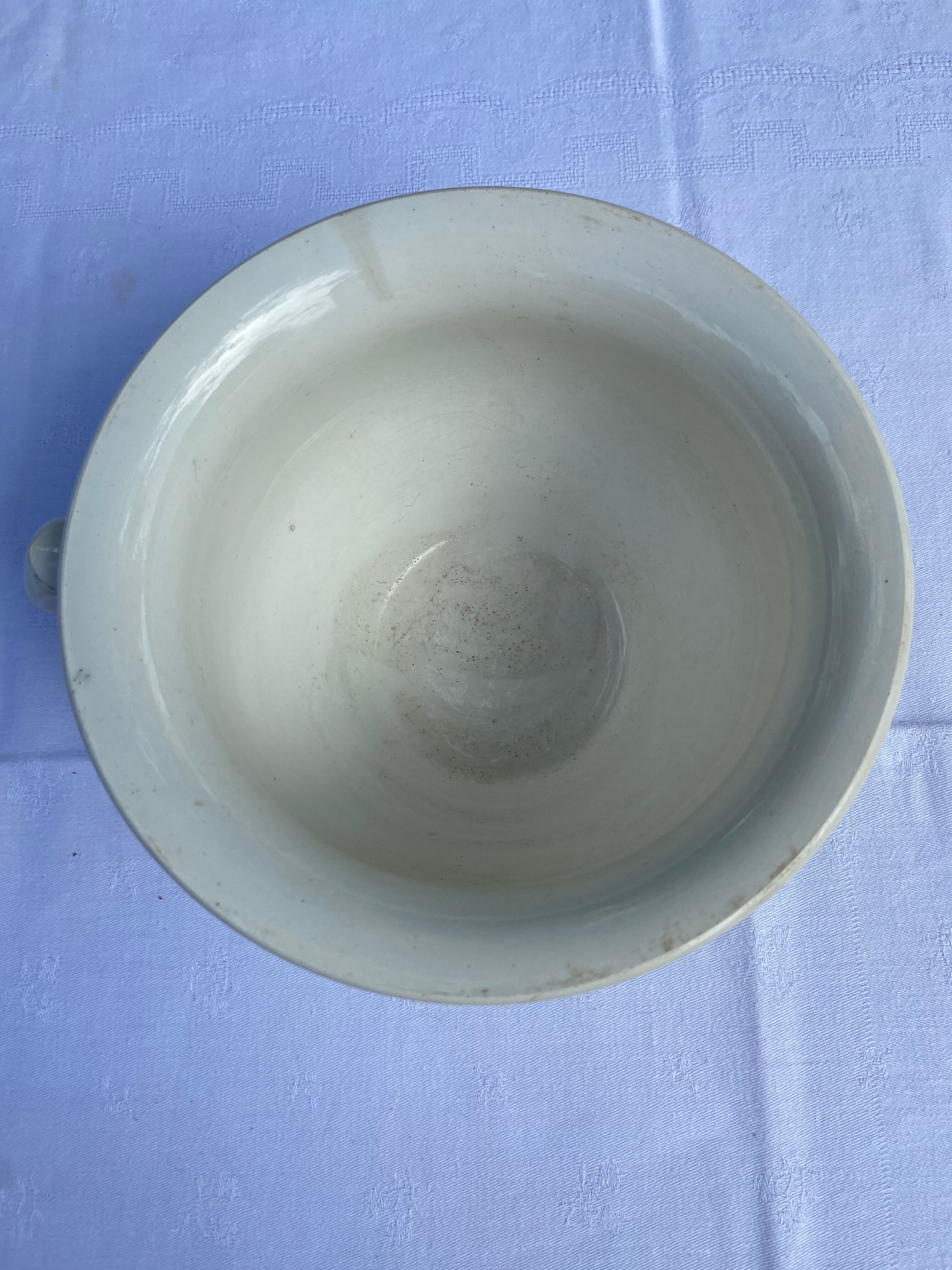 Old Digoin chamber pot in white earthenware – repurposed as a dice bowl.