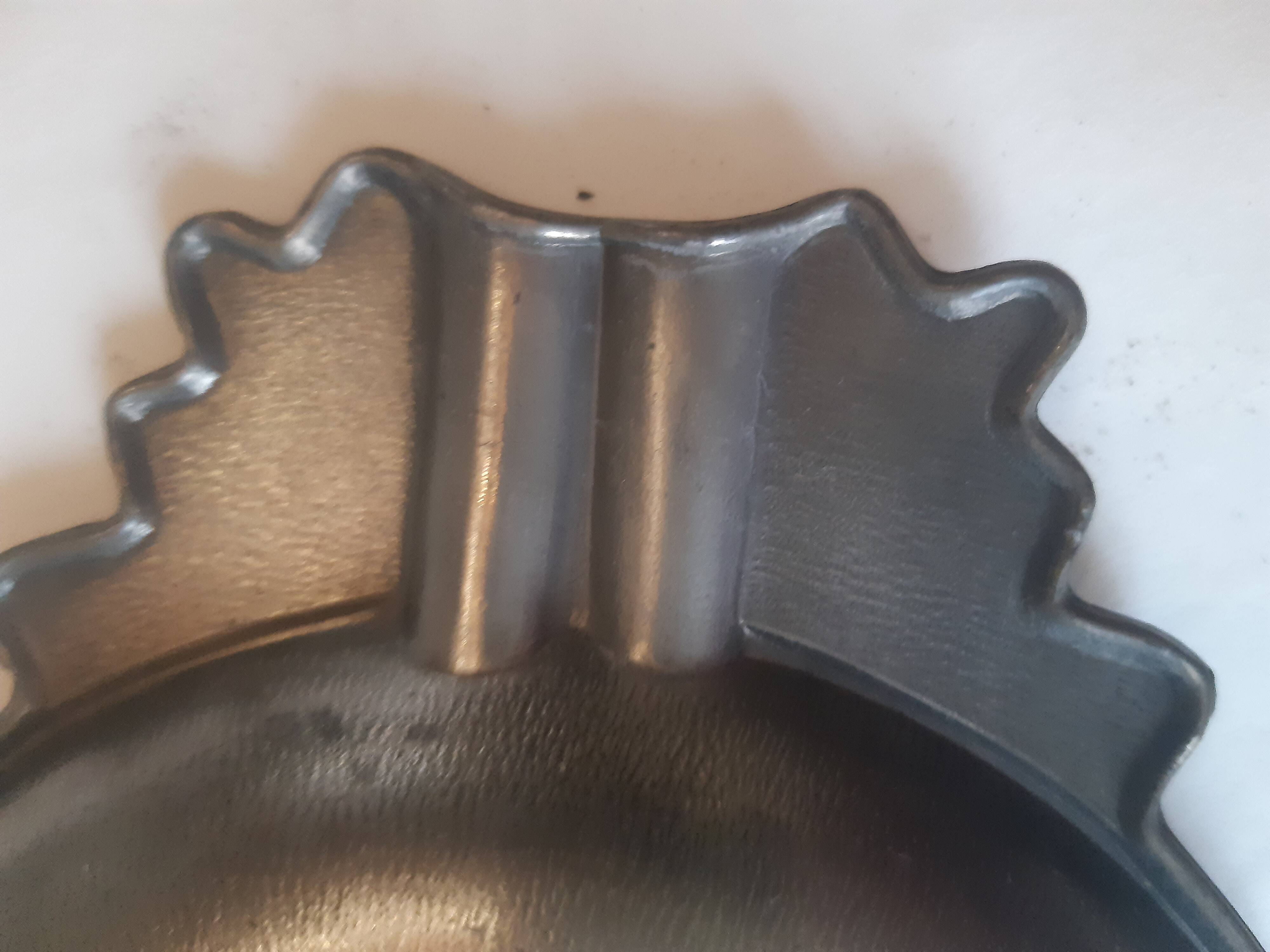 Decorated pewter ashtray
