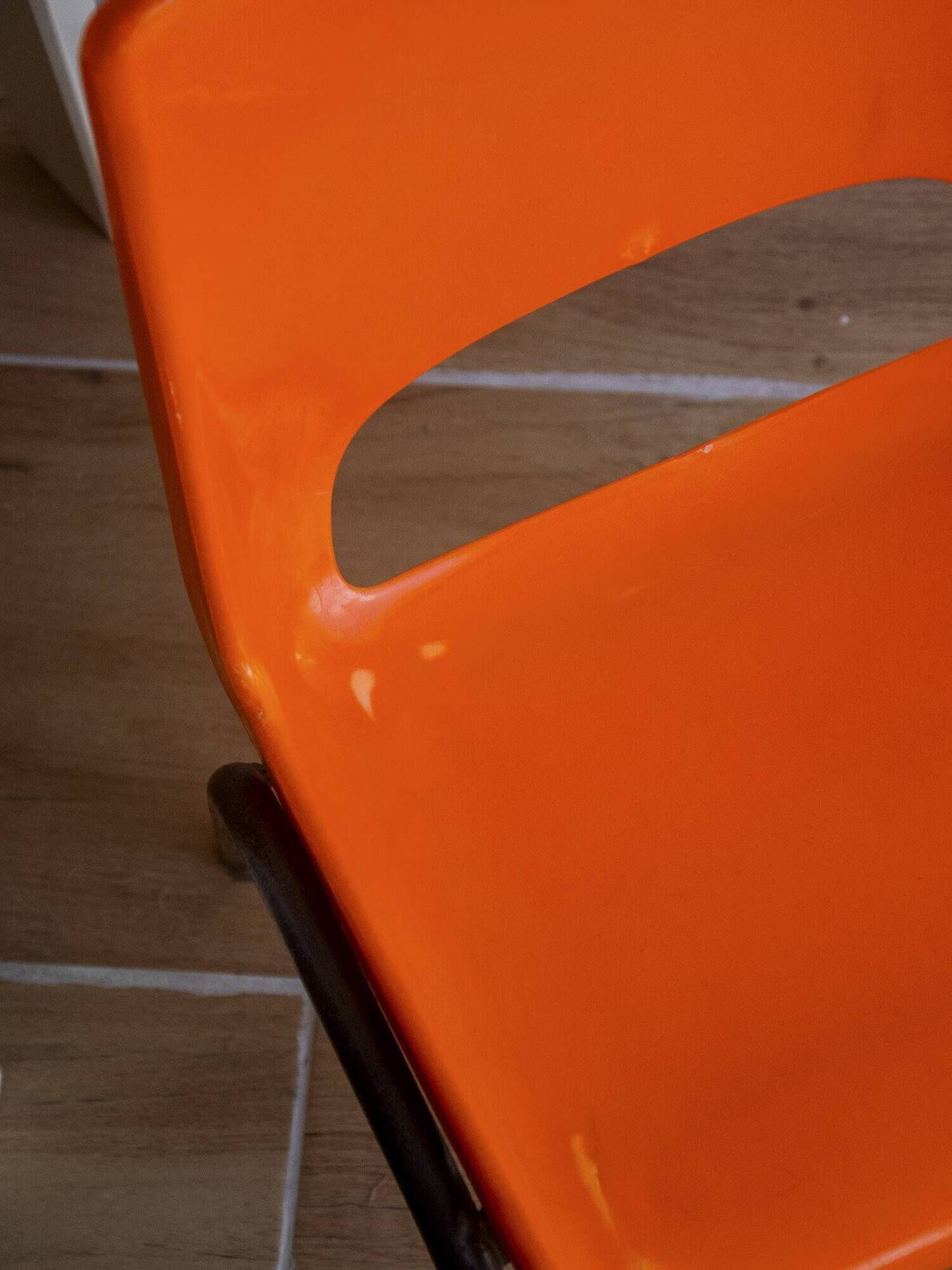 Vintage orange children's chair from the seventies.