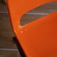 Vintage orange children's chair from the seventies.