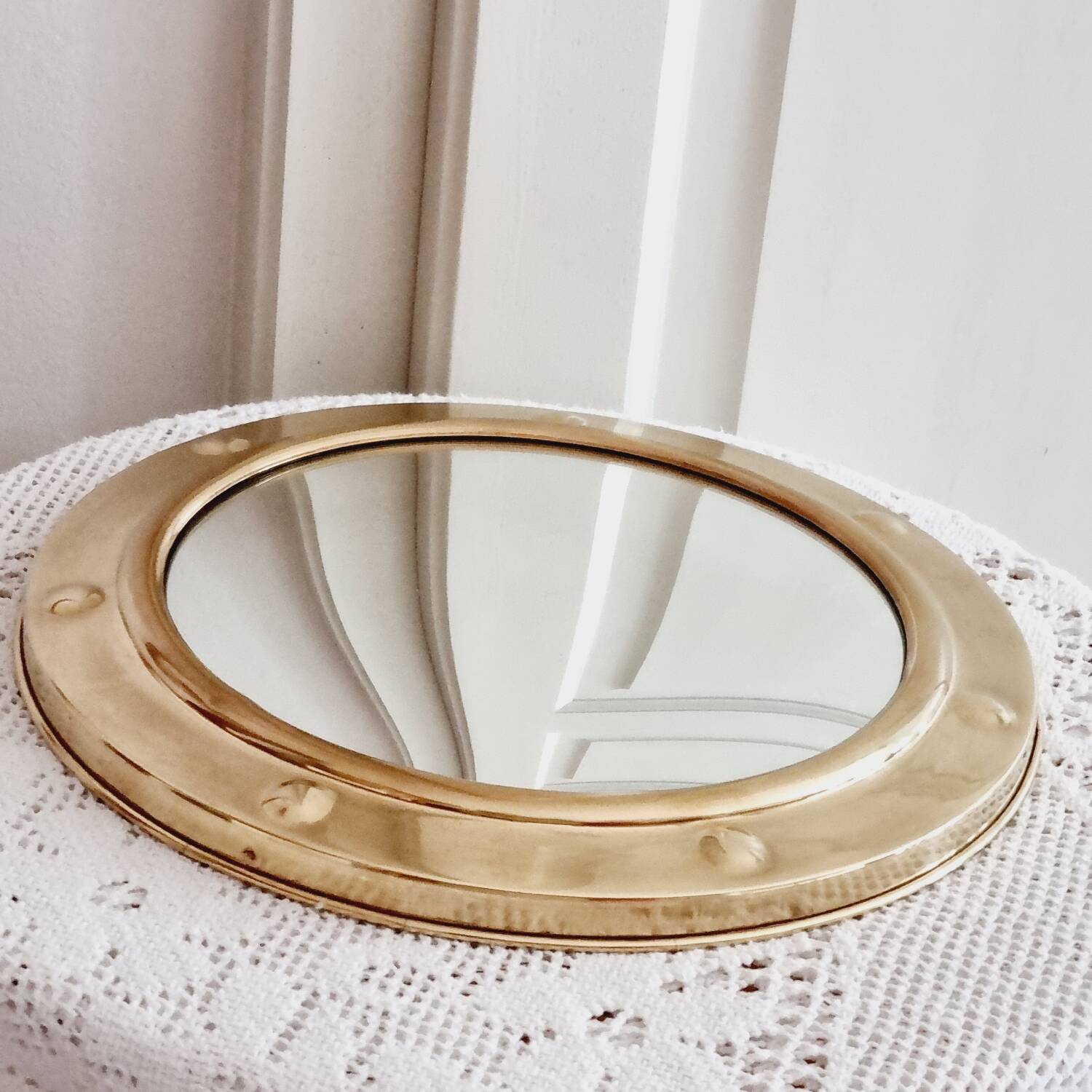 Brass witch's eye porthole mirror
