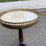 Tripod marble guéridon in gilded Louis XVI style.