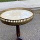 Tripod marble guéridon in gilded Louis XVI style.