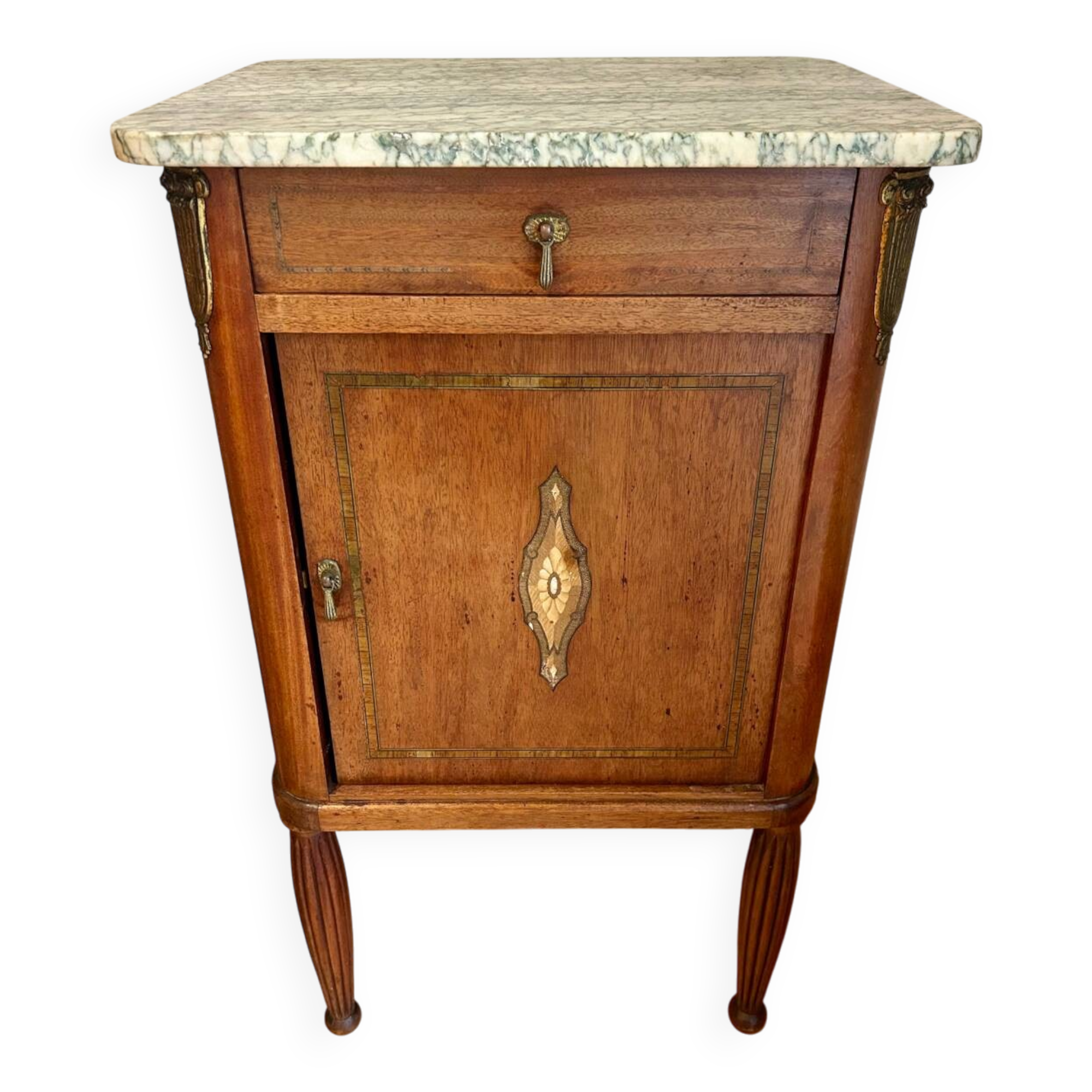 Antique bedside table in wood and marble – adorned with gilded brass ornaments –