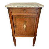 Antique bedside table in wood and marble – adorned with gilded brass ornaments –