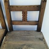 Pair of ethnic crude wooden chairs