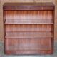 Pair of open low bookshelves Shaws of London in hardwood.