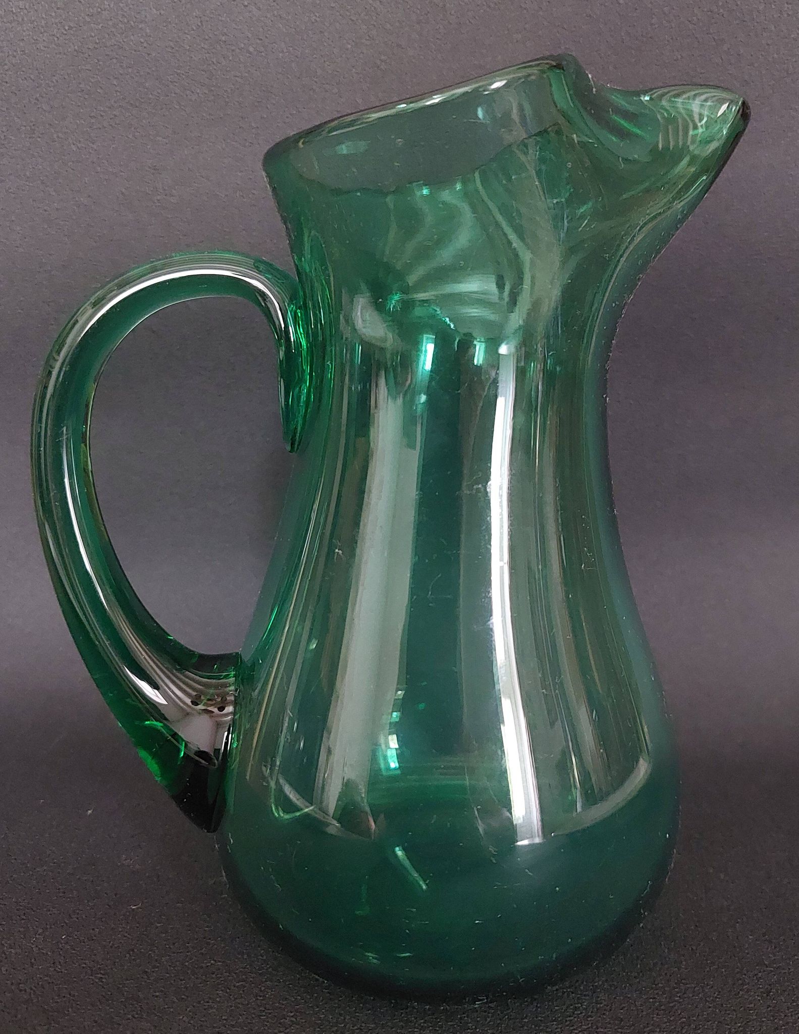 20th century green glass pitcher