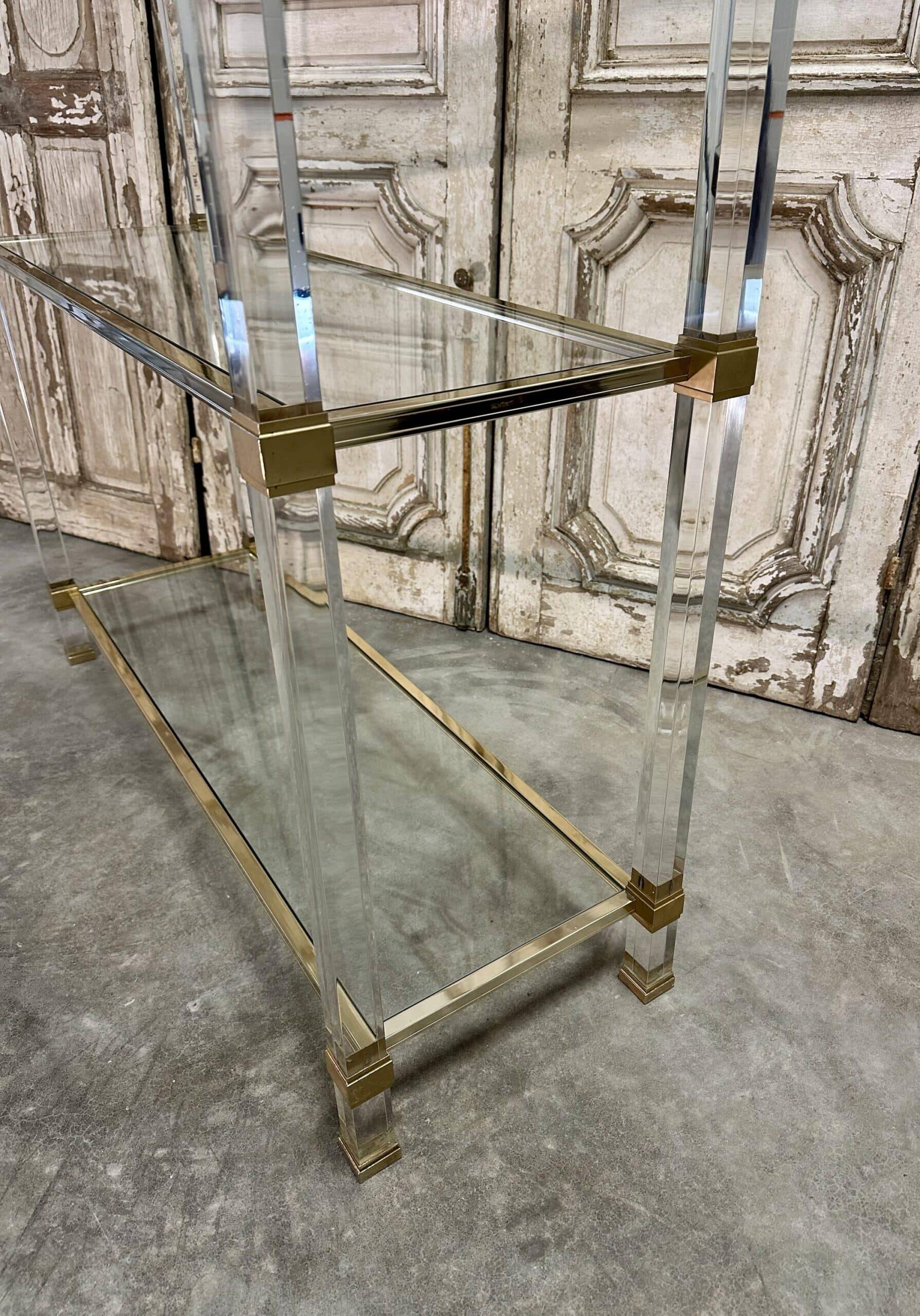 Plexiglass shelf by Pierre Vandel in Hollywood Regency style circa 1970.