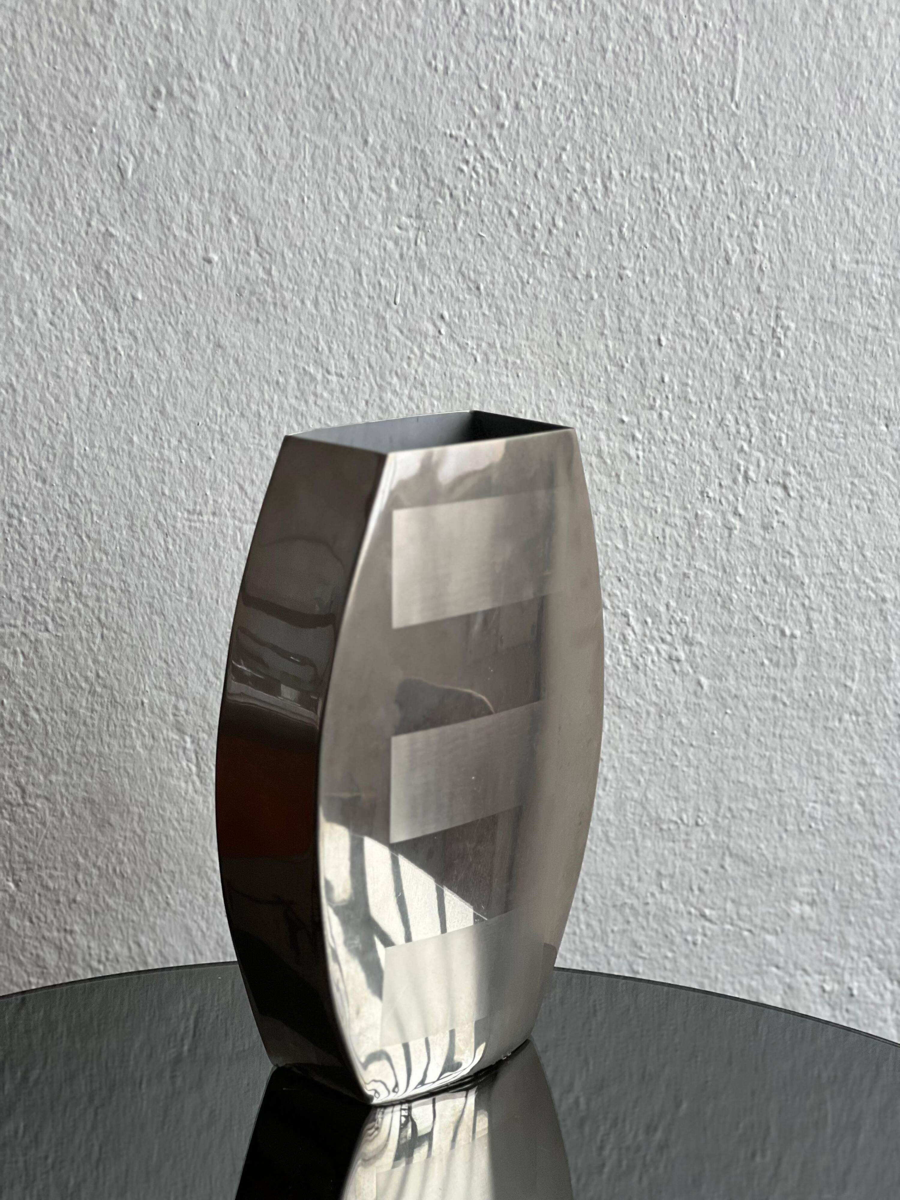 Decorative stainless steel vase with geometrical shapes imprinted, 1970's