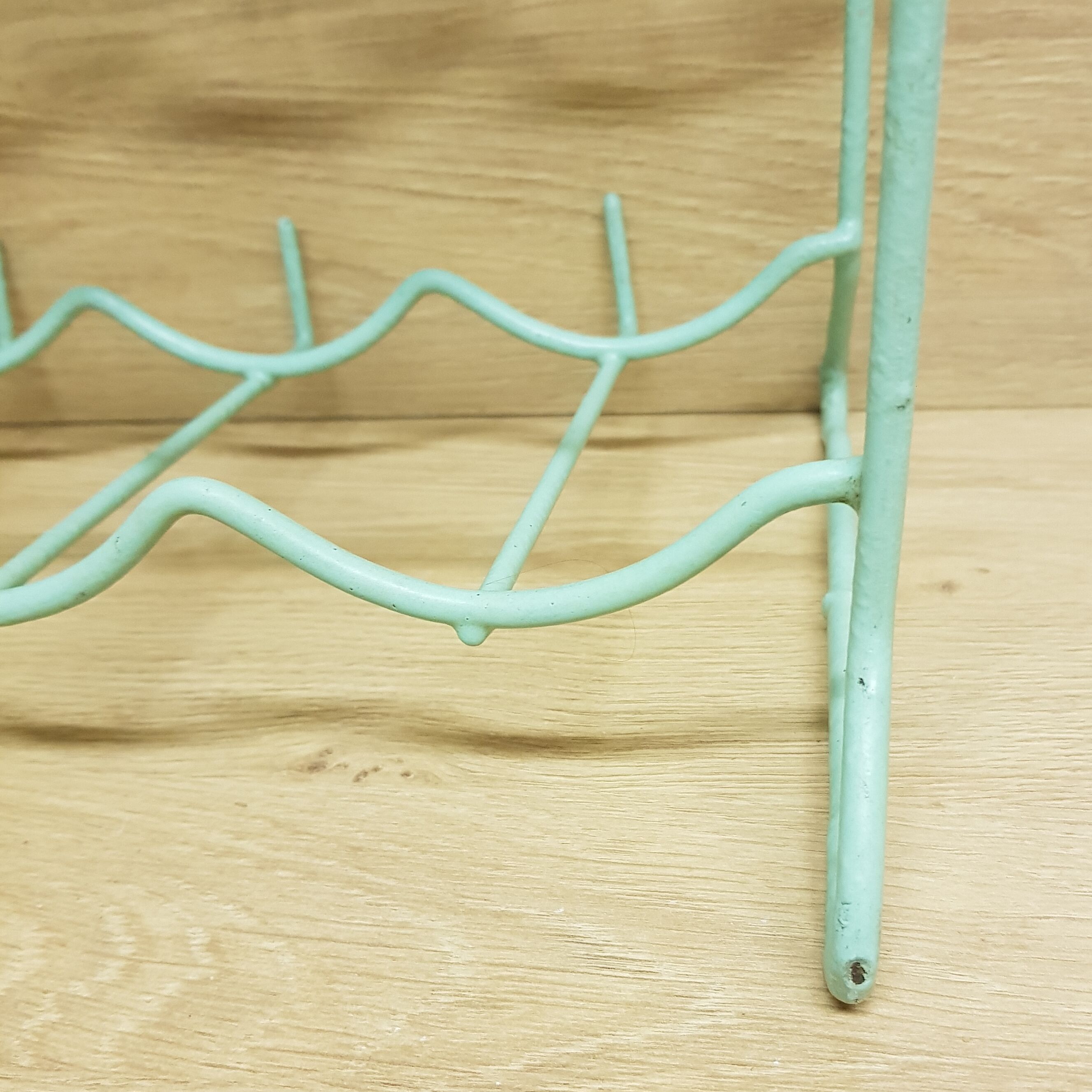 Metal aqua green bottle rack