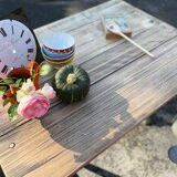 Old table with patinated green legs