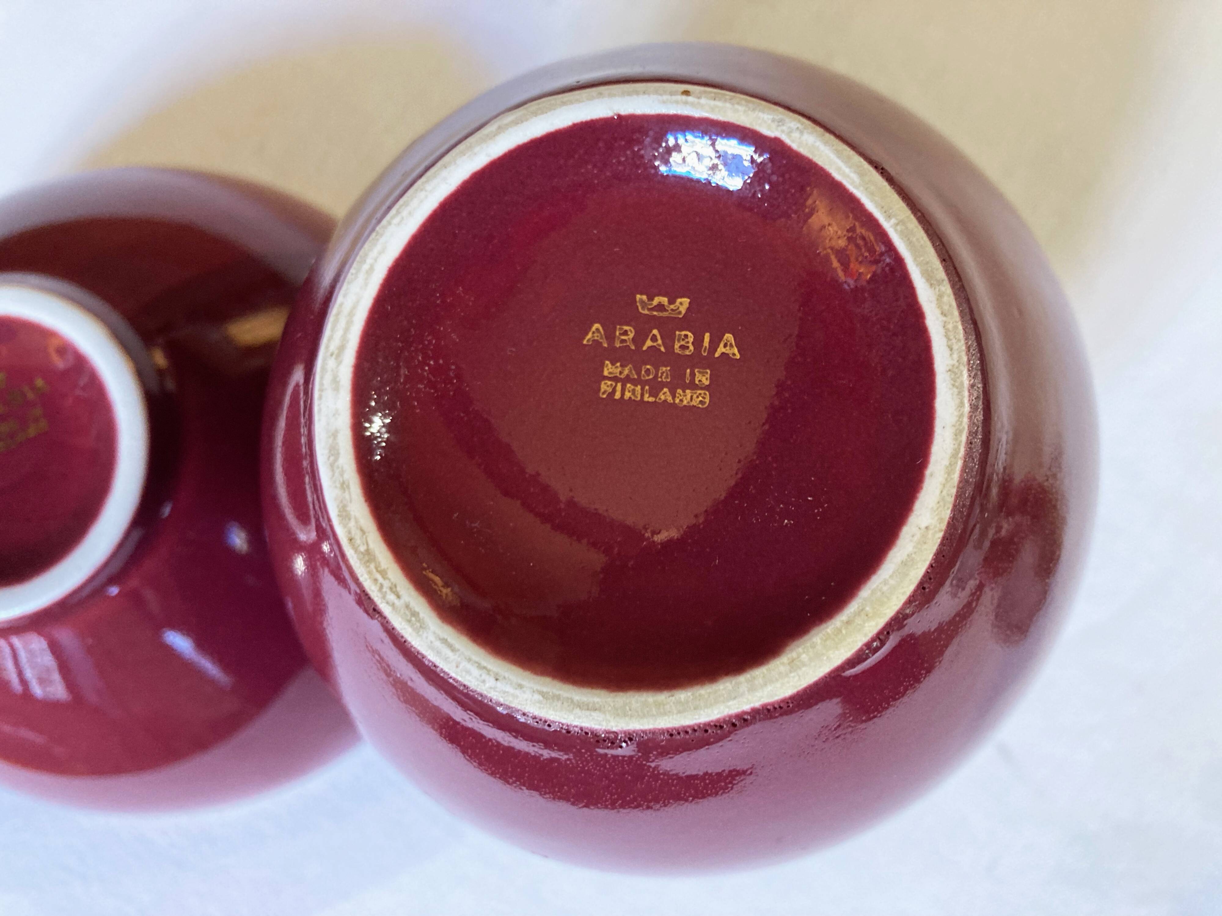 Raspberry-colored ceramic soliflore vase and bowl, enhanced with gilding, Arabia, Finland